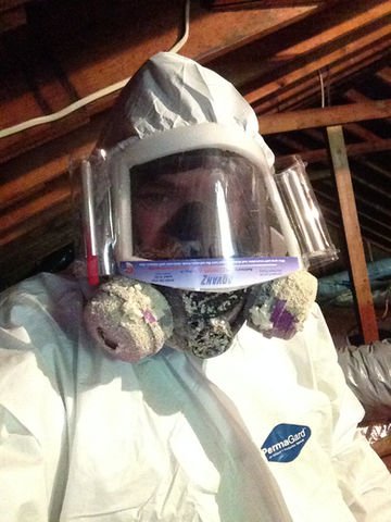 Worker in full protective suit