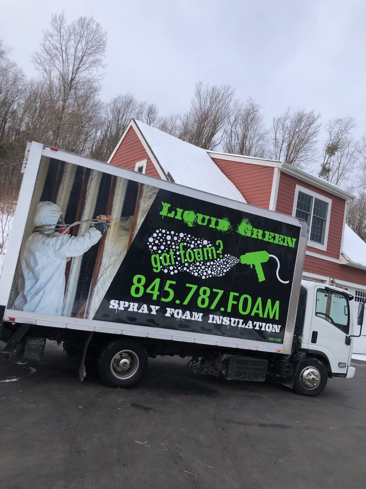 Liquid Green truck at a residential home